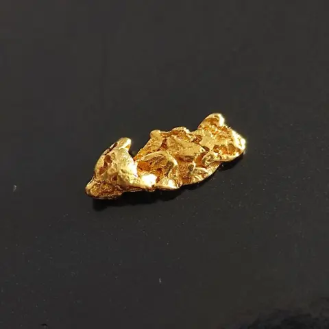 Goud Goud nugget - 3×4×11 mm - 0.46 g