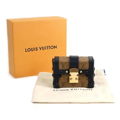 Louis Vuitton - Monogram Reverse Essential Trunk Bag Charm