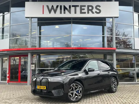 BMW iX xDrive40 Executive 77 kWh Accu SOH 97,4%! | Head-Up Display | 360 Camera | Leder | Stoelverwa