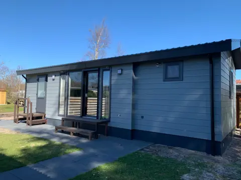 Mooi chalet op familiecamping in het bos