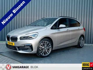 BMW 2 Serie Active Tourer 218i Business Edition Plus | Panodak | Head Up | Trekhaak afnb. | Camera |