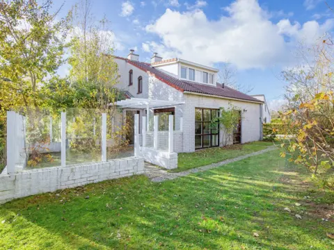 Comfortabel vakantiehuis met eigen tuin en terras, vlakbij het Krimbos