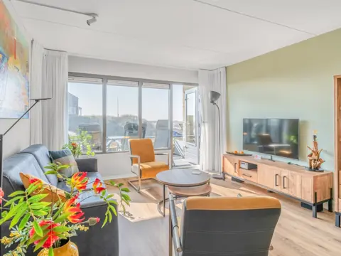 Appartement bij De Koog met terras op het zuiden