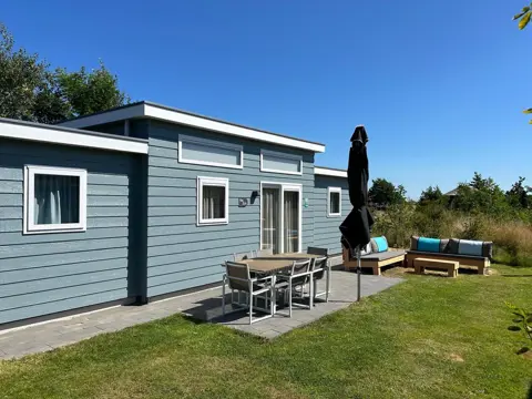 Trendy en luxe chalet met grote tuin op het zuiden in het bos
