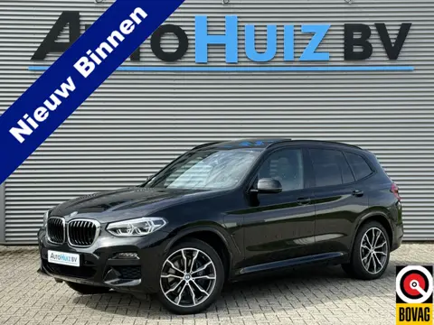BMW X3 xDrive30e High Executive M Sport LED Panoramadak Trekhaak 20 Inch LMV Carplay Lederen interie