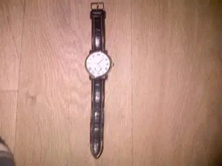 Orginele Tommy Hilfiger horloge. Met zwart leren band.