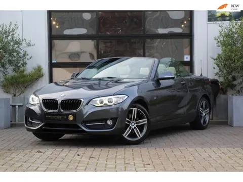 BMW 2-serie Cabrio 218i Sportline - LEDER - NAVI - LED - PDC - STOEL VERW - ELEK KAP - CRUISE - DEAL
