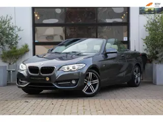 BMW 2-serie Cabrio 218i Sportline - LEDER - NAVI - LED - PDC - STOEL VERW - ELEK KAP - CRUISE - DEAL