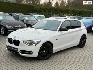 BMW 1-serie 118i Business+ Sport|Nieuwe Ketting + Klepseals|Navigatie|Cruise control|Automaat|Nette 
