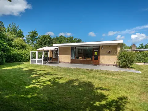 Genieten in de natuur in knus vakantiehuis met tuin in het bos