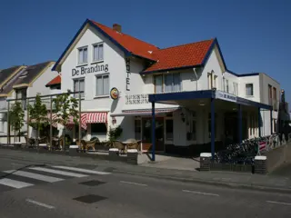 Familiekamer bij het strand met balkon op het zuiden