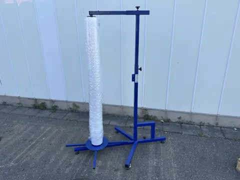 Foliewikkelaar Multifunctionele dispenser voor het afrollen van topvellen of afdekvellen