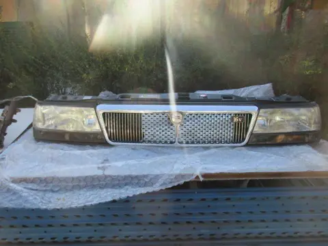 Front grill with headlights Lancia Thema 16v
