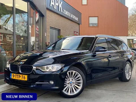 BMW 3 Serie Touring 320i High Executive | Navi Pro| Stoel verw. | PDC | Elektr. koffer