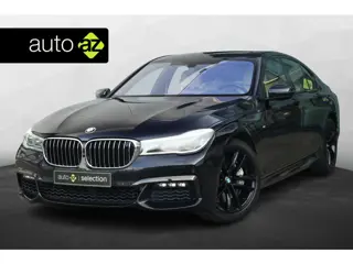 BMW 7-serie 750i xDrive High Executive / Pano / HUD / H&K