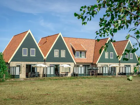 Vakantiehuis met uitzicht over heidevelden en weiland nabij De Koog