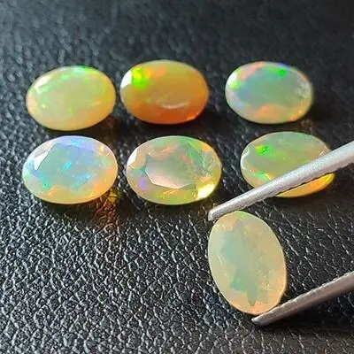 7 pcs Kleurenspel Opaal - 3.35 ct