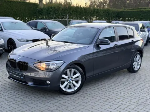 BMW 1-serie 116i Business Sport|Nieuwe Ketting + Klepseals|Carplay|Cruise control|Trekhaak|Airco|Net