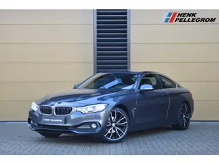 BMW 4 Serie Coupé 420i High Executive * Head-up * 19 inch lm * Sportstoel * Rondom Camera *