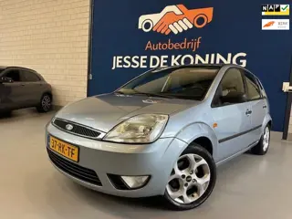 Ford Fiesta 1.4-16V Ghia / 5 deurs / airco / sportvelgen / trekhaak / parrot / stereo / zuinig / APK