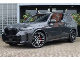 BMW X5 xDrive50e | Dravitgrau, M Sportpakket Pro, Sportstoelen, Massage, Carbon interieur, Driving A