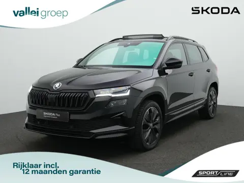 Skoda Karoq 1.5 TSI ACT 150 pk DSG Sportline | Panoramadak | Leder | Geheugenstoelen | Adaptief onde