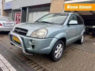 HYUNDAI TUCSON 2.7i V6 4WD Style AUT LEER DAK CLIMA LMV PDC NAP APK 6-2026