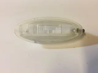 Kentekenplaatverlichting boven Opel Corsa B 90511731