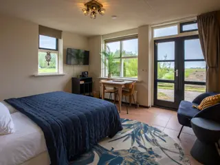 Pluskamer op begane grond met heerlijke uitzicht en eigen terras