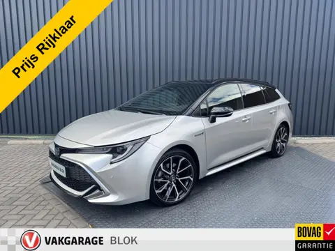 Toyota Corolla Touring Sports 2.0 Hybrid Executive / Bi tone | JBL | Head-up | 18 inch | PDC | Rijkl