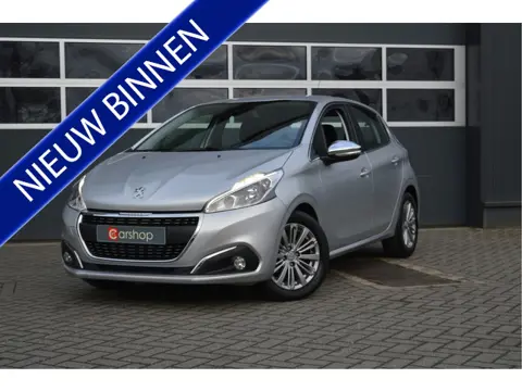 Peugeot 208 1.2 PureTech Allure | Airco/PDC/Navi | Met 12 maanden garantie!