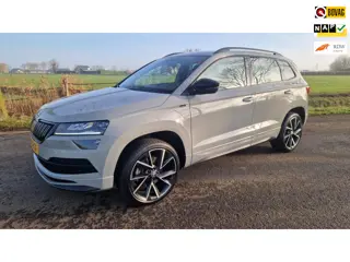 Skoda Karoq 1.5 TSI ACT Sportline Business, dealer onderhouden.