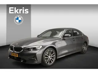 BMW 3 Serie Sedan 320e | Laserlicht | Leder | Navigatie | Active cruise | Trekhaak | Sportstoelen | 