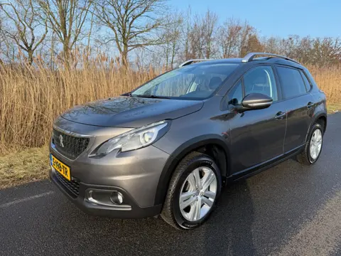 Peugeot 2008 1.2 PureTech Signature | CARPLAY | HOGE INSTAP | CRUISE CONTROL | CAMERA | NAVI |