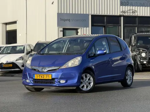 Honda Jazz 1.4 Hybrid Exclusive Lage km✅ LEER | PANORAMADAK | Stoelverwarming | Automaat