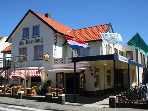 Luxe familiesuite met balkon en extra slaapkamer nabij het strand