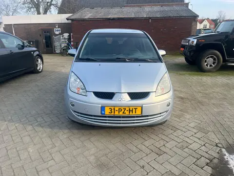 Mitsubishi Colt 1.3 Invite+ airco lm velg cv elec ramen