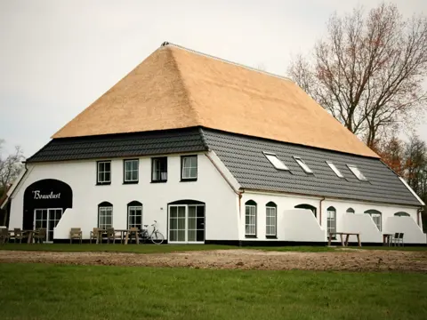 Appartement nabij De Cocksdorp in sfeervolle omgebouwde boerderij