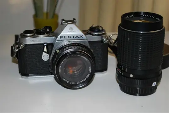 Pentax spiegelref. camera + smc objectief 135 mm