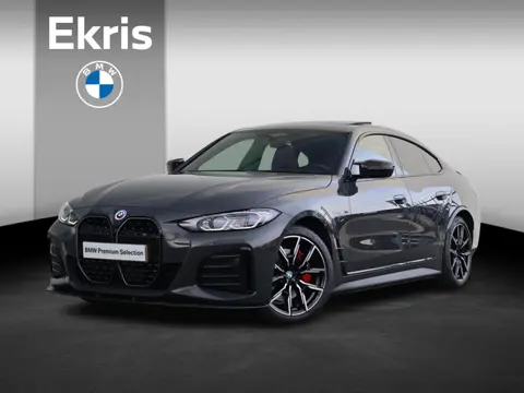 BMW i4 M50 84 kWh / Schuif - Kanteldak / Harman Kardon / Elektrische Verstelbare Stoelen / M-Stoelen