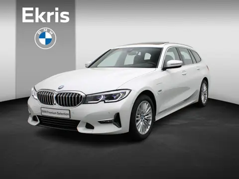 BMW 3 Serie 320e Touring High Executive | Luxury Line | Parking Pack | Achteruitrijcamera | Panorama