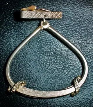 Dasklem in vorm van gestyleerde stijgbeugel, +/1950