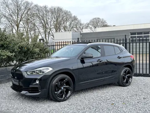 BMW X2 sDrive18i Exe LED|Pano|Navi|Trekhaak|Media Zwart