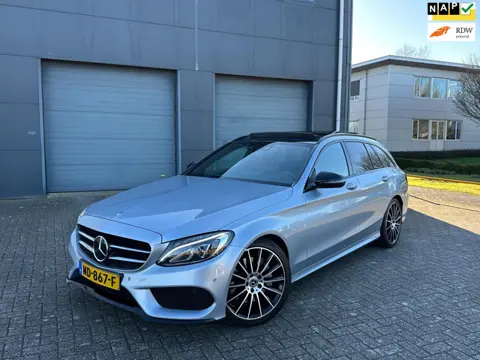 Mercedes-Benz C-klasse Estate 300 HYBRID ///AMG 2017 Pano Dealer onderhouden