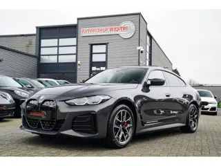 BMW I4 M50 High Executive 84 kWh | BTW | 360 Camera | LASER | Dravitgrau metallic | Adaptieve Cruise