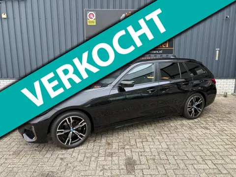 BMW 3-serie Touring 320i High Executive M