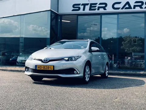 Toyota Auris Touring Sports 1.8 Hybrid Executive, Navi, Camera, Stoelverwarming, P Sensor, Half lede