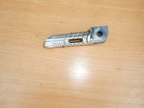 Footrest left Suzuki GSX R 1000 2005 - 2006
