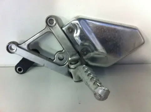 Main step holder left Aprilia RSV 1000 2001 - 2003