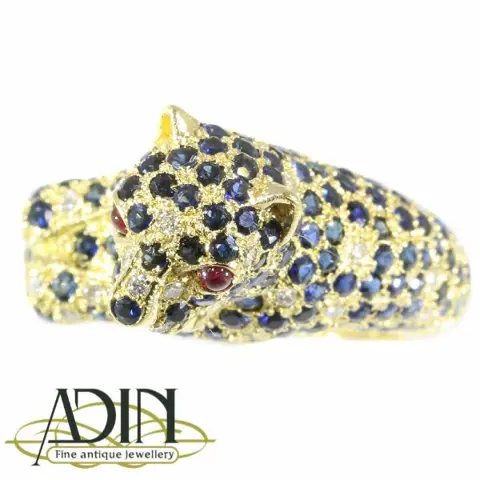 Cartier panther ring met diamanten en saffier